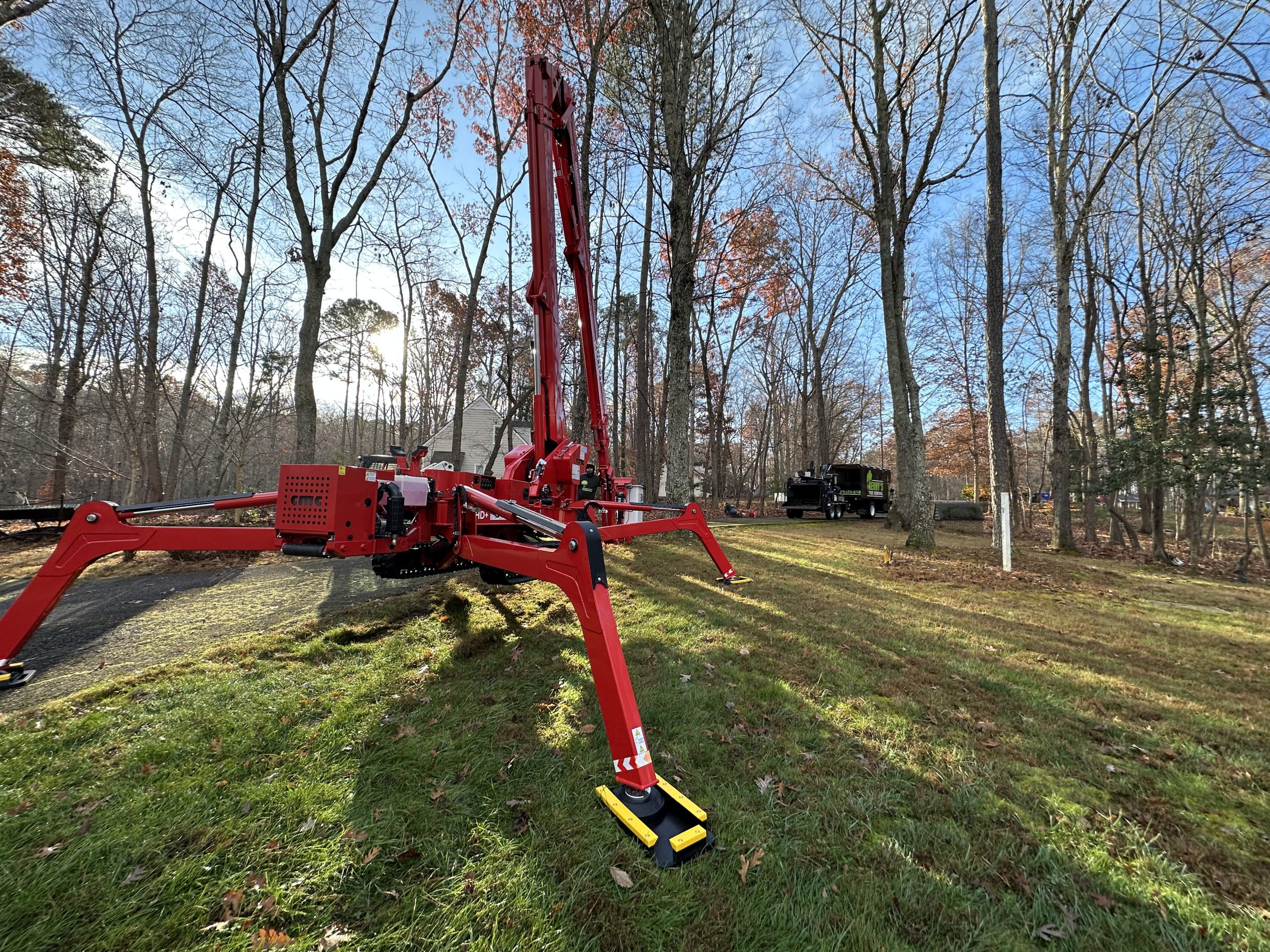 tree trimming with spider lift